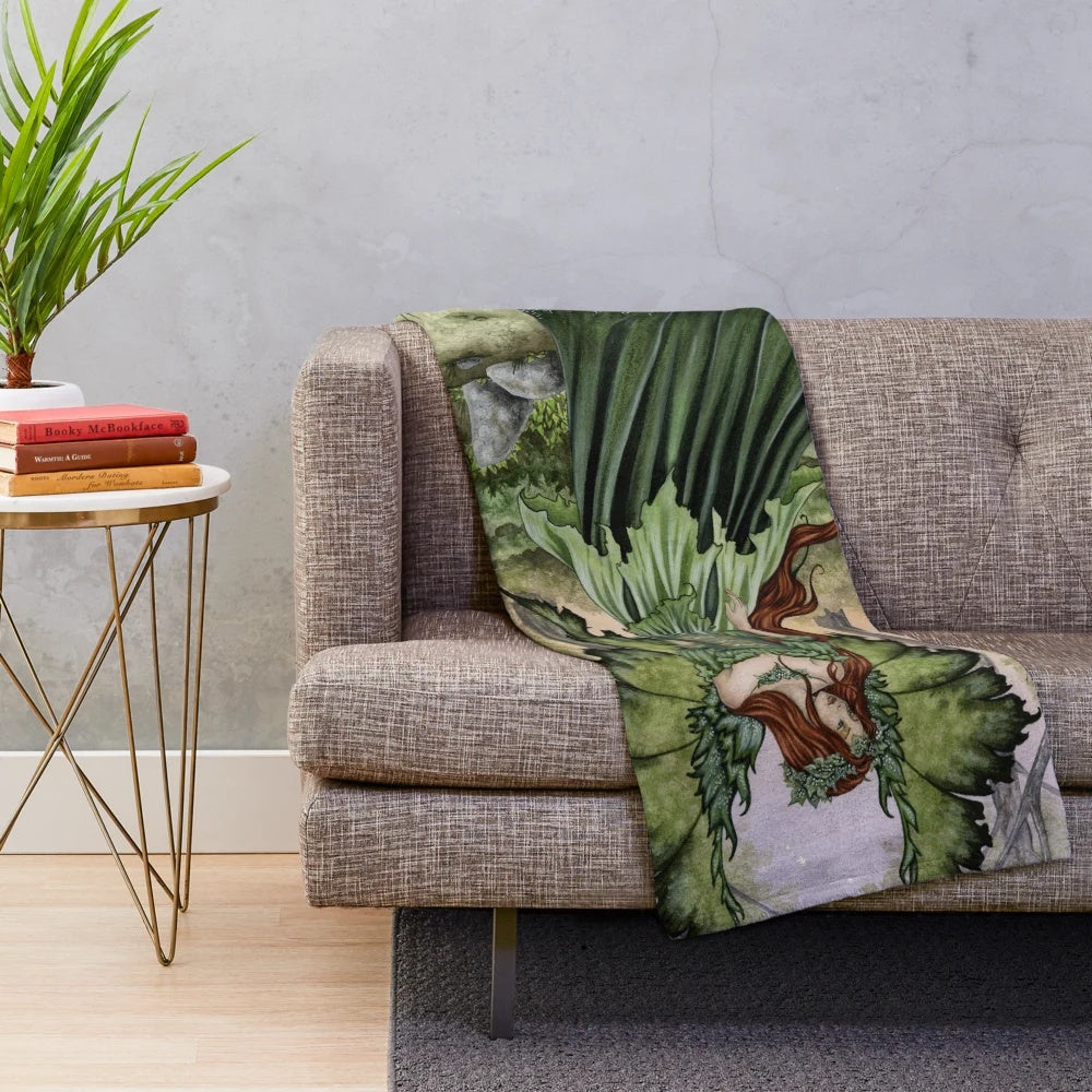 Plush blanket featuring a fantasy forest scene with a fairy maiden