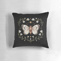 Mystical pillow with a design featuring moths, butterflies, and celestial elements