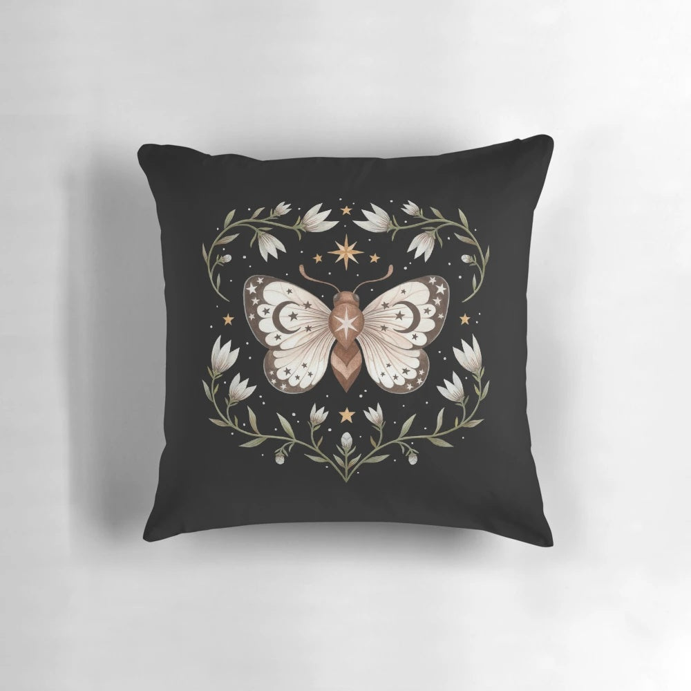 Mystical pillow with a design featuring moths, butterflies, and celestial elements