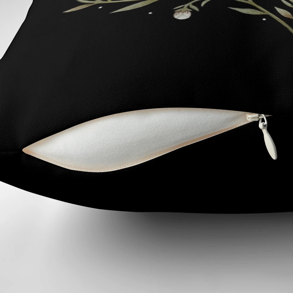 Mystical pillow with a design featuring moths, butterflies, and celestial elements