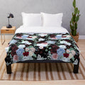 Midnight floral plush blanket with mythical design elements