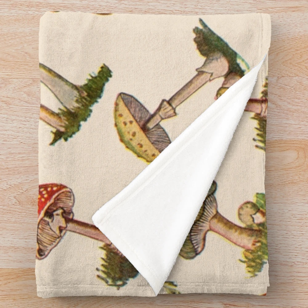 Soft and whimsical plush blanket featuring a magical mushroom design