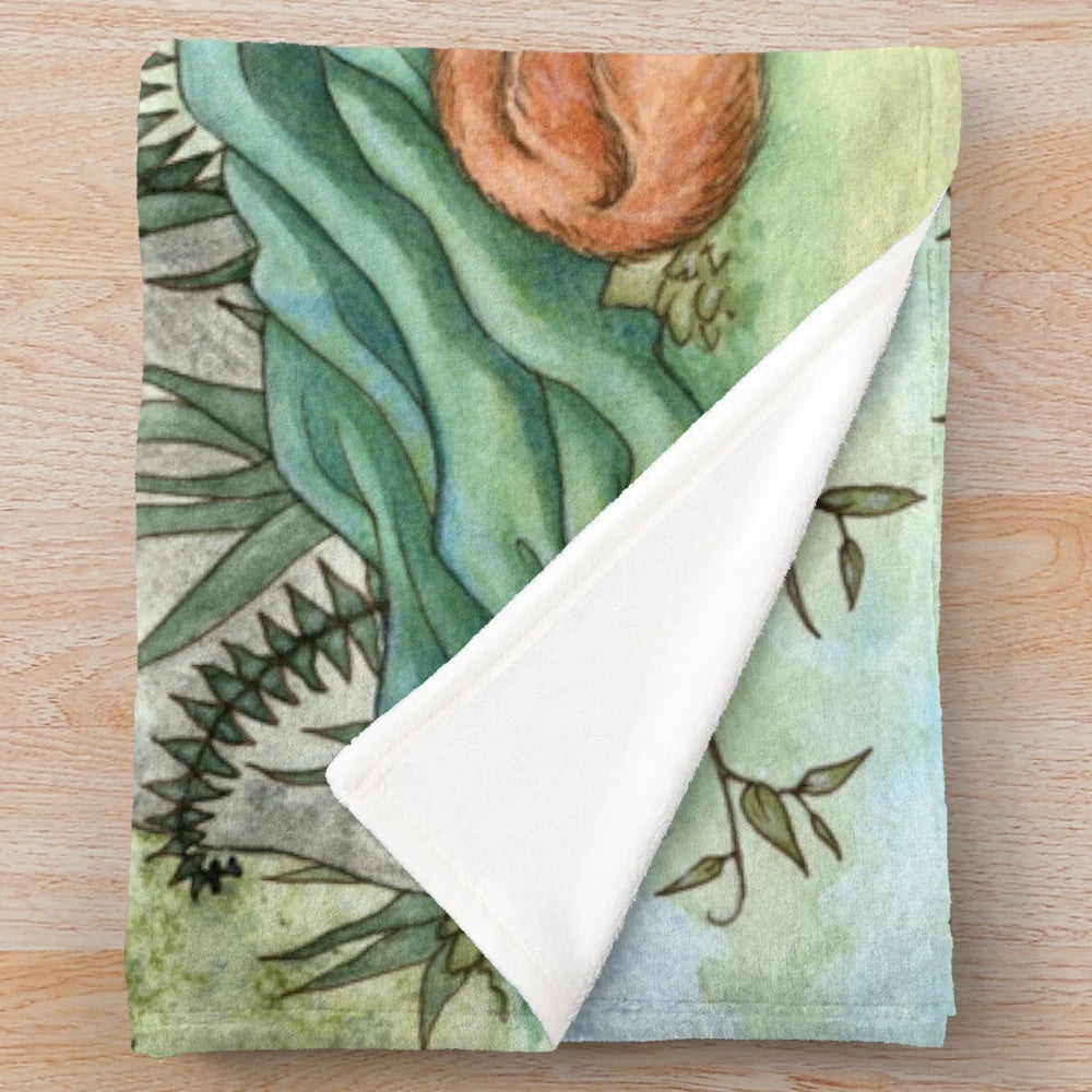 Plush blanket featuring whimsical woodland creatures in a fairy fantasy design