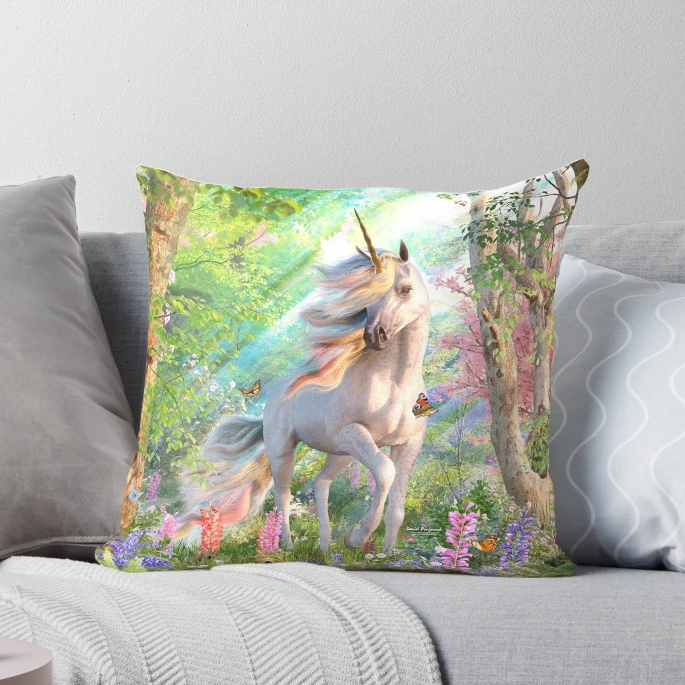 Whimsical throw pillow featuring a unicorn in an enchanted forest with castles, rainbows, and butterflies