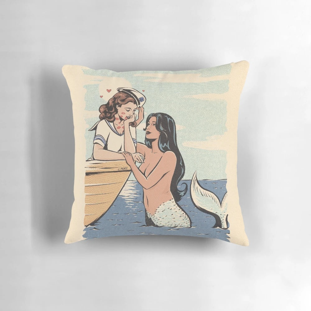 Enchanted vintage-style pillow with a mermaid and sailor design, featuring LGBTQ+ pride colors and themes.