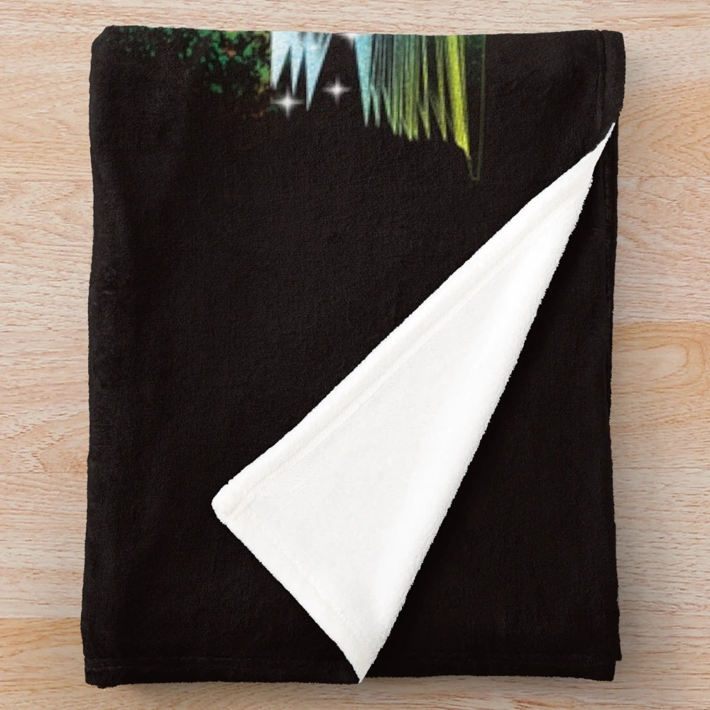 Cozy plush blanket featuring a vintage wizard design, perfect for book lovers