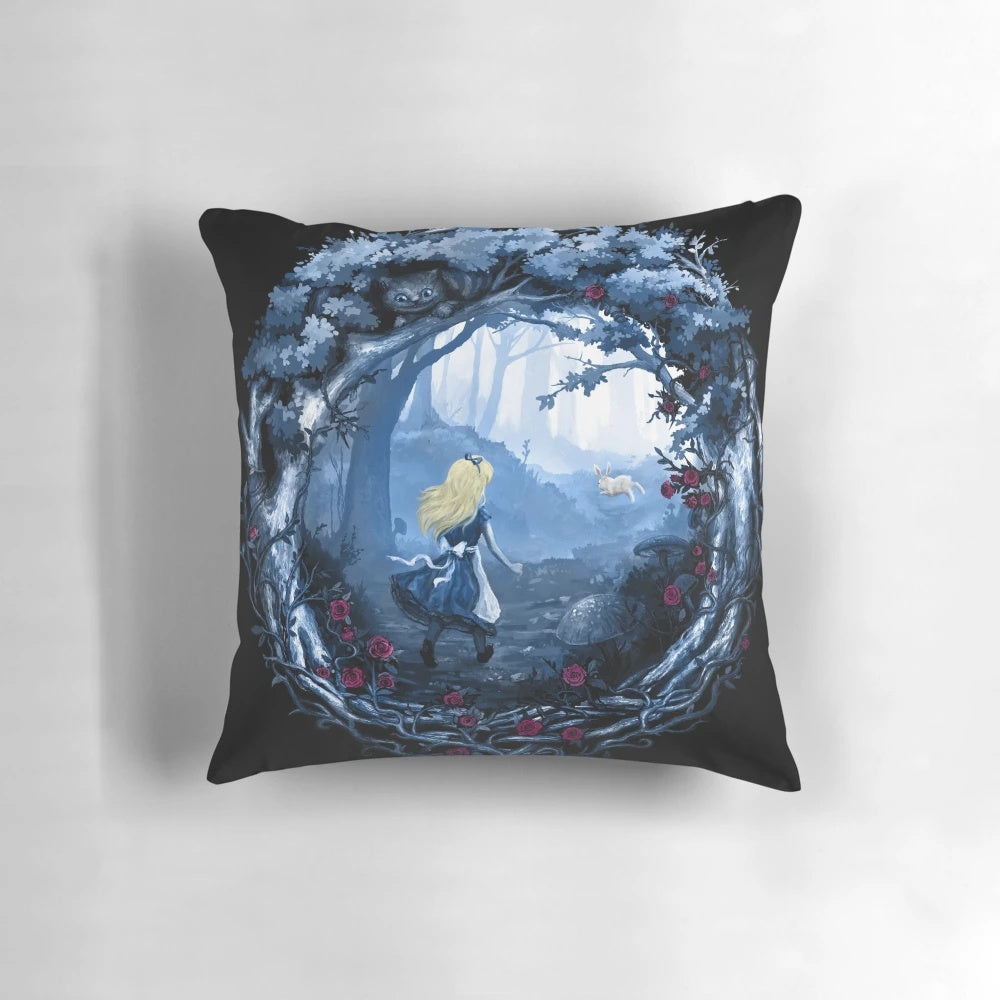 A soft, plush pillow featuring an Alice in Wonderland-inspired design with a white rabbit, flowers, and nature elements.