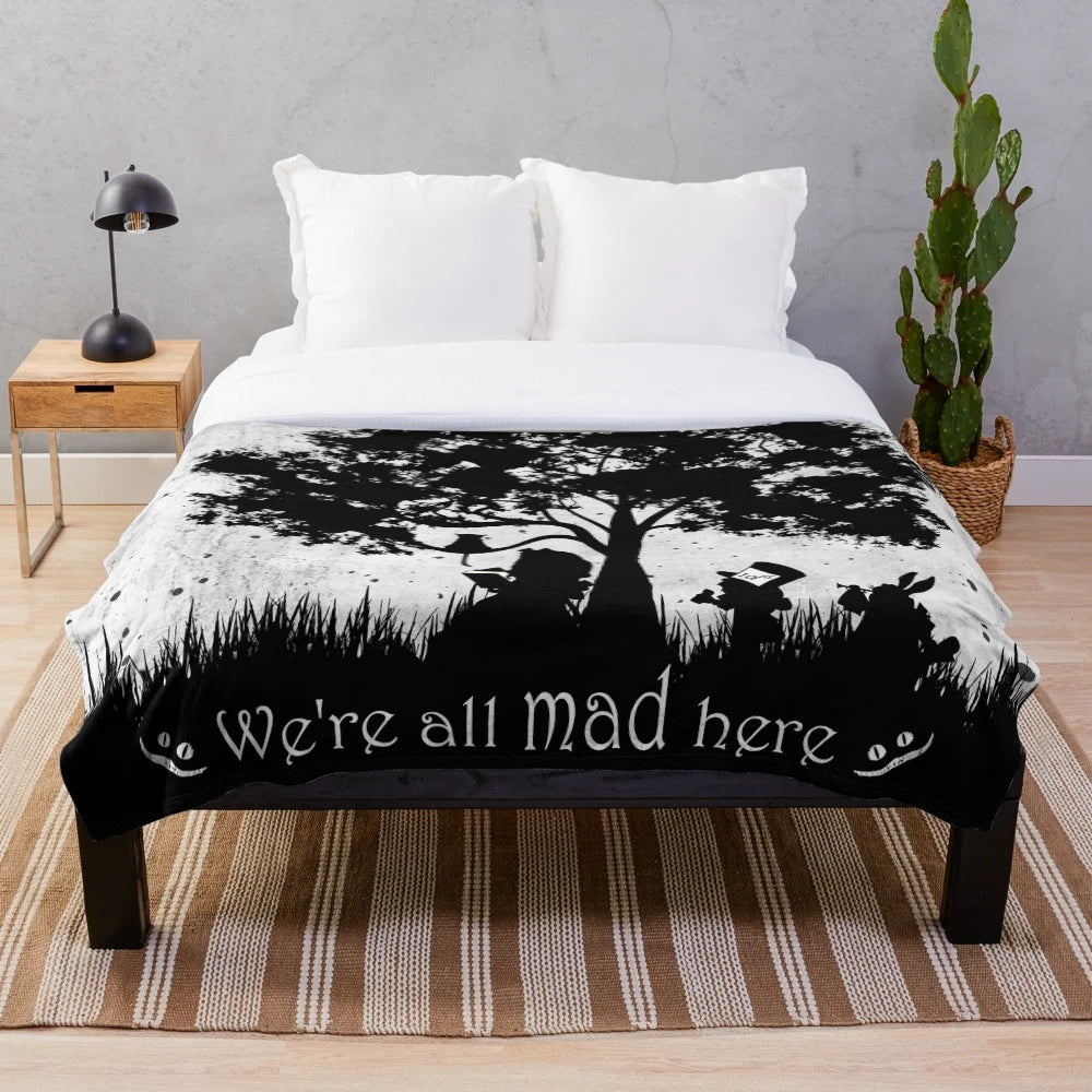 Plush blanket featuring the Cheshire Cat from Alice in Wonderland