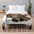 Plush blanket featuring a fantasy couple in magical setting