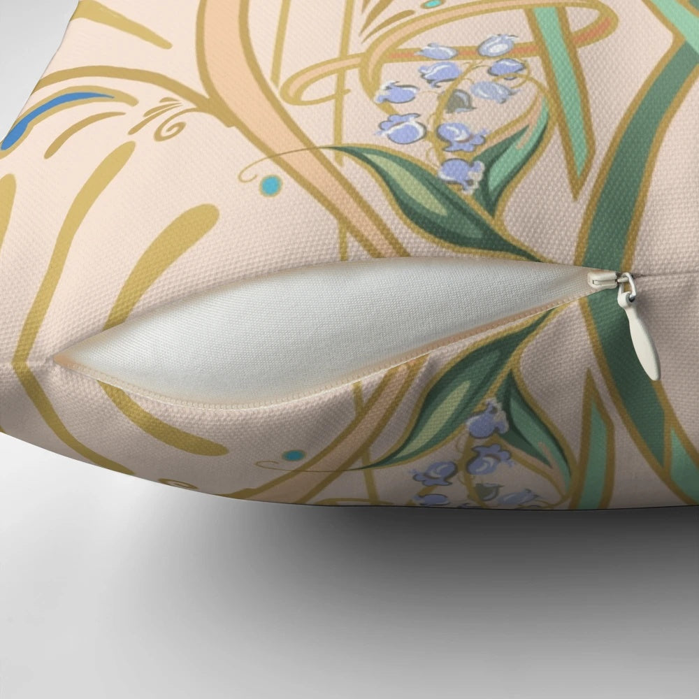 Blush-colored art nouveau style pillow with a repeating dragonfly pattern