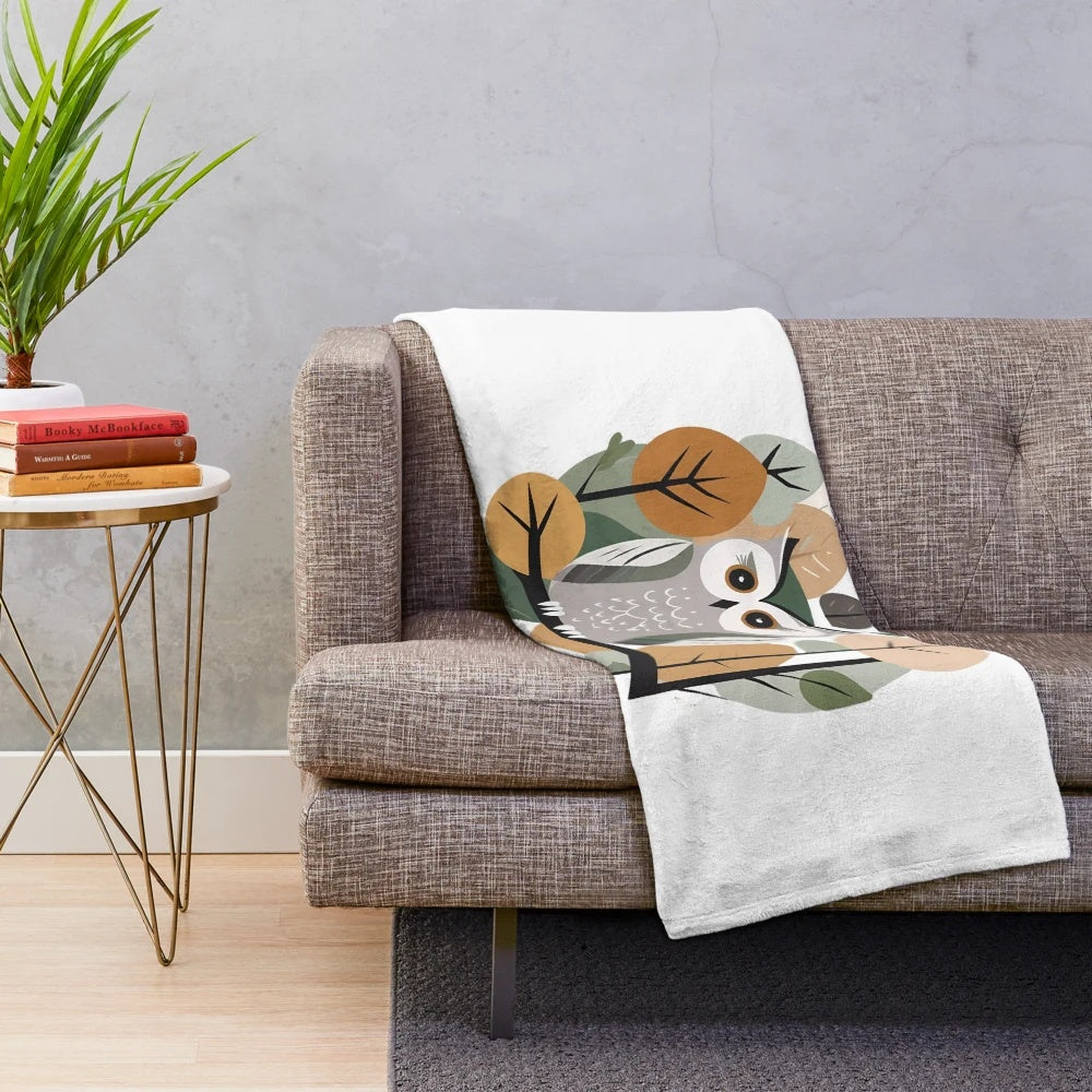 Plush blanket featuring a whimsical autumn woodland animal design