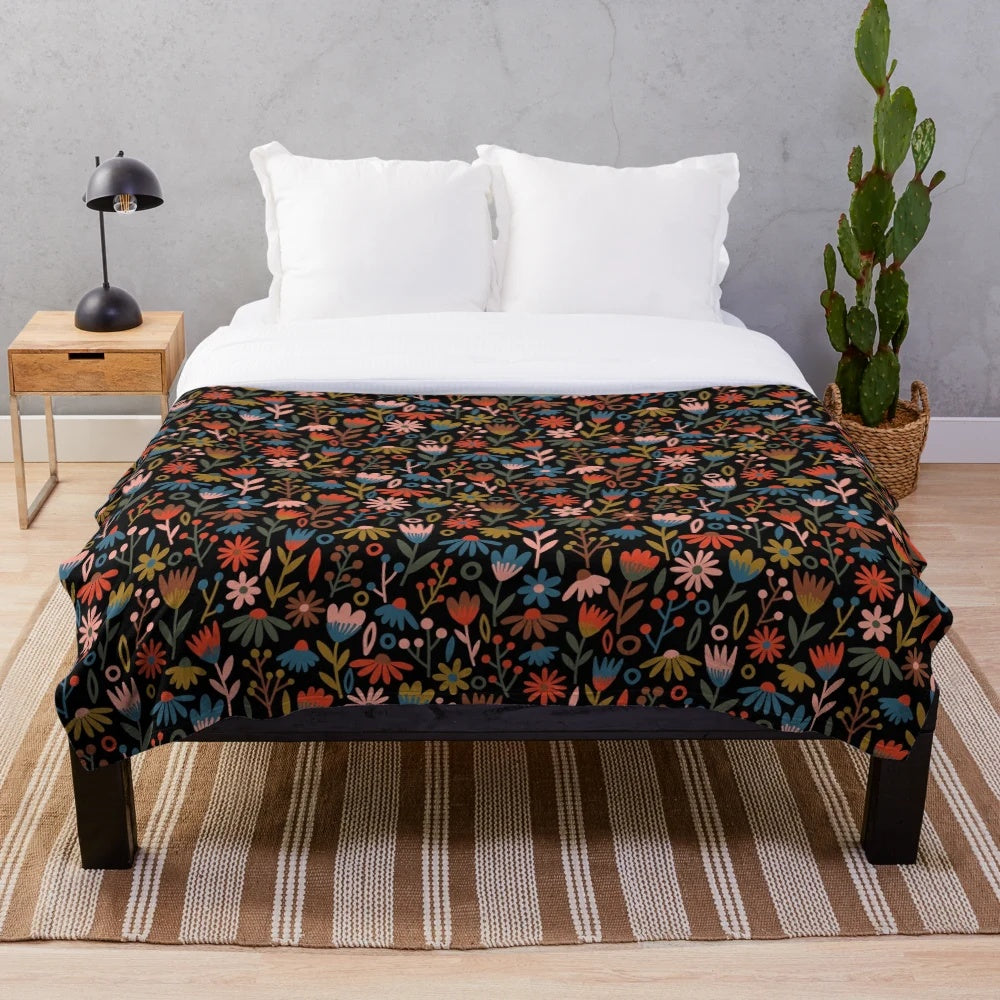 Black floral plush blanket with mythical and elegant design