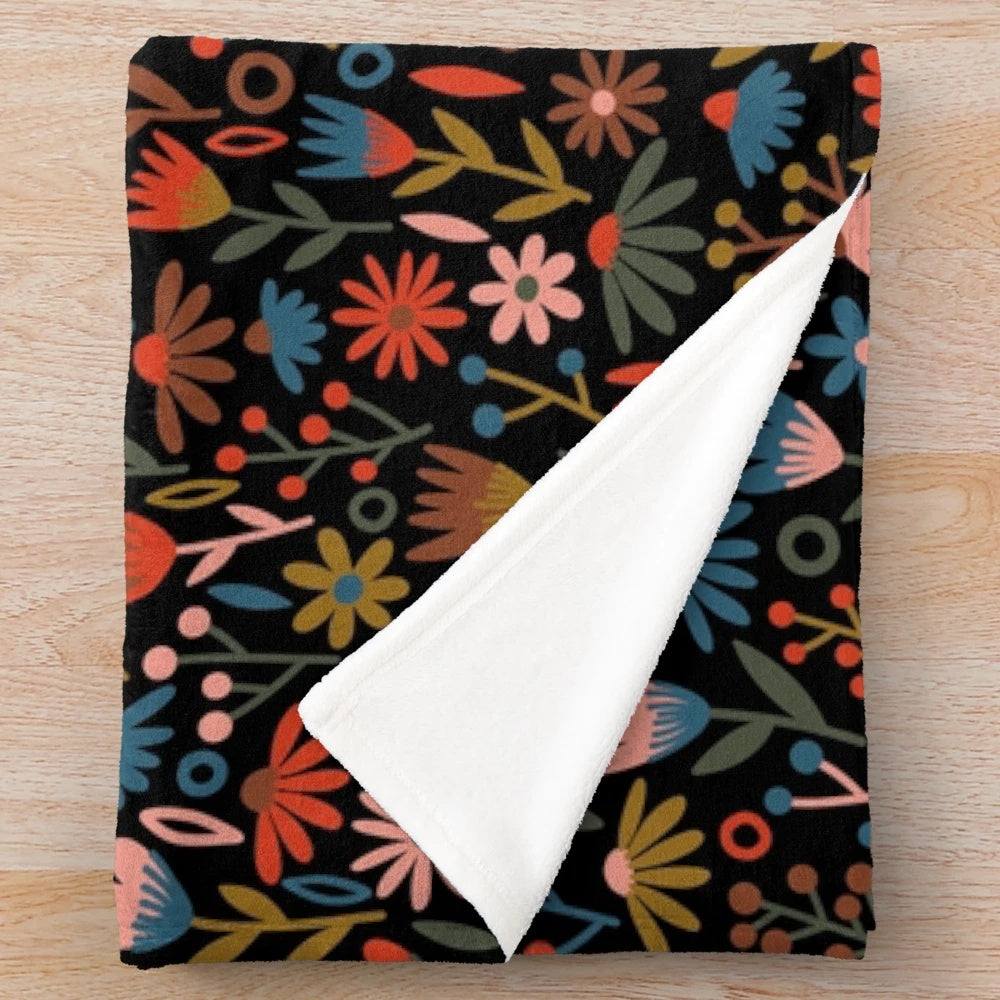 Black floral plush blanket with mythical and elegant design
