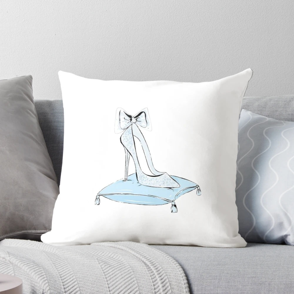 A blue princess-themed pillow featuring a glass slipper design and sparkling details.