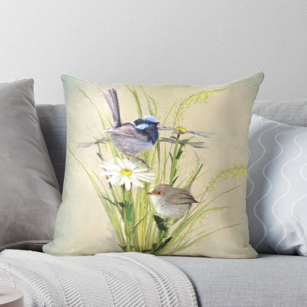 A soft, plush pillow featuring the vibrant blue and gray plumage of a fairy wren, a beloved Australian garden bird.