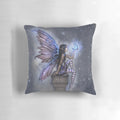 Whimsical blue fairy floating in front of a night sky with stars and a crescent moon, by fantasy artist Molly Harrison.