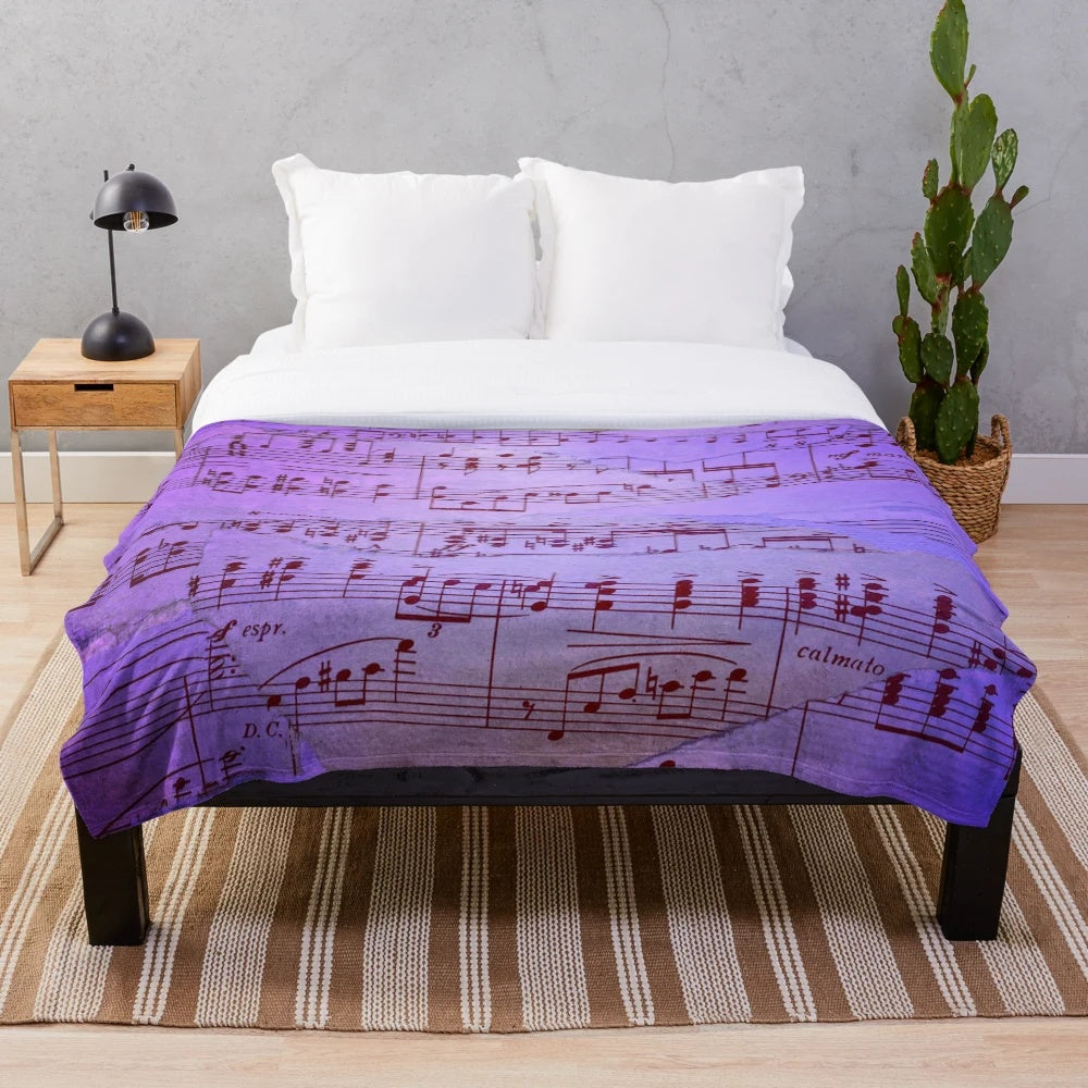 Blue sheet music patterned plush blanket