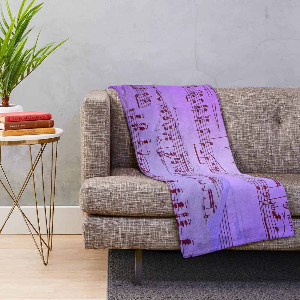 Blue sheet music patterned plush blanket