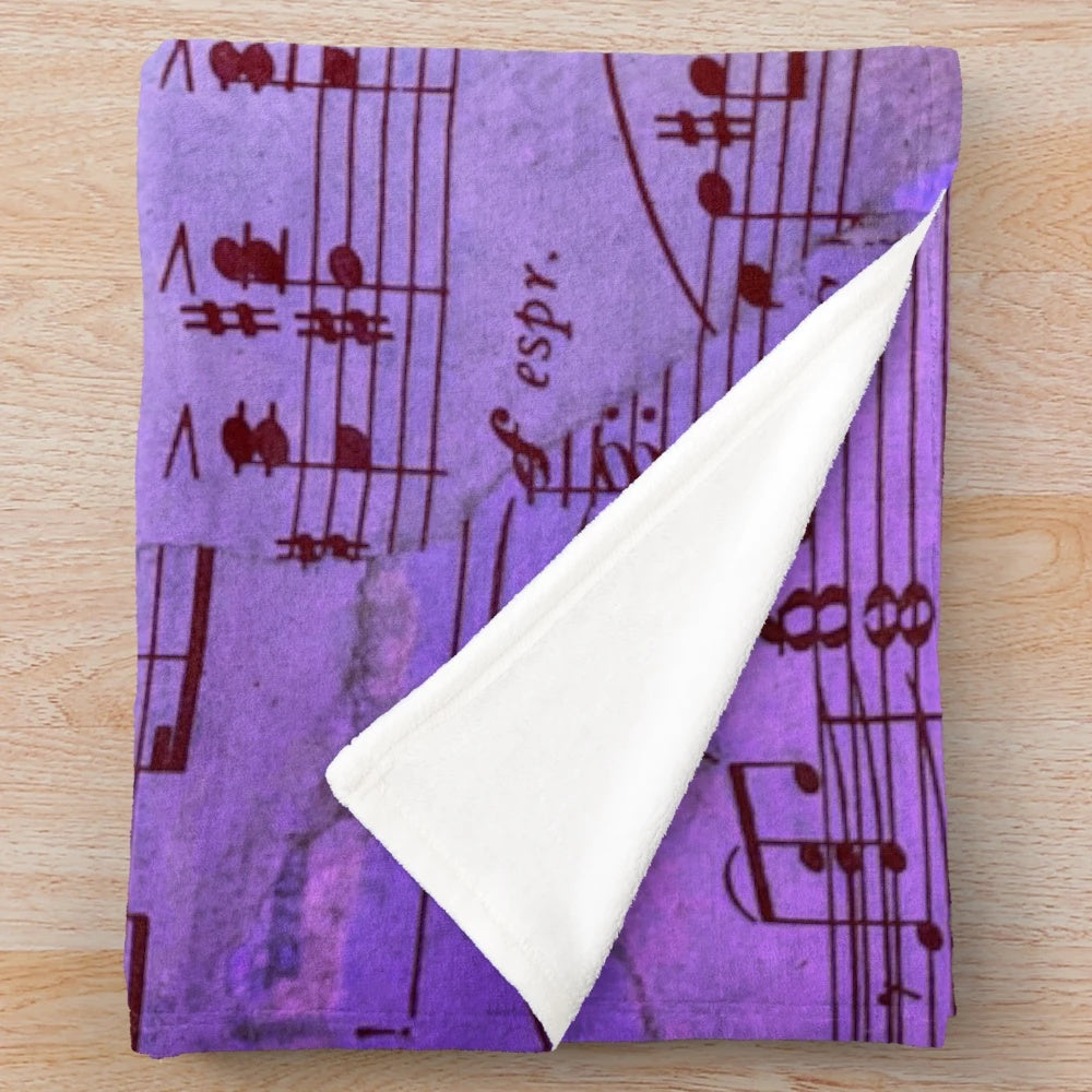 Blue sheet music patterned plush blanket
