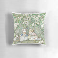 A decorative baby pillow featuring a charming Brambly Hedge-inspired design with hawthorn blossom and baby mice.