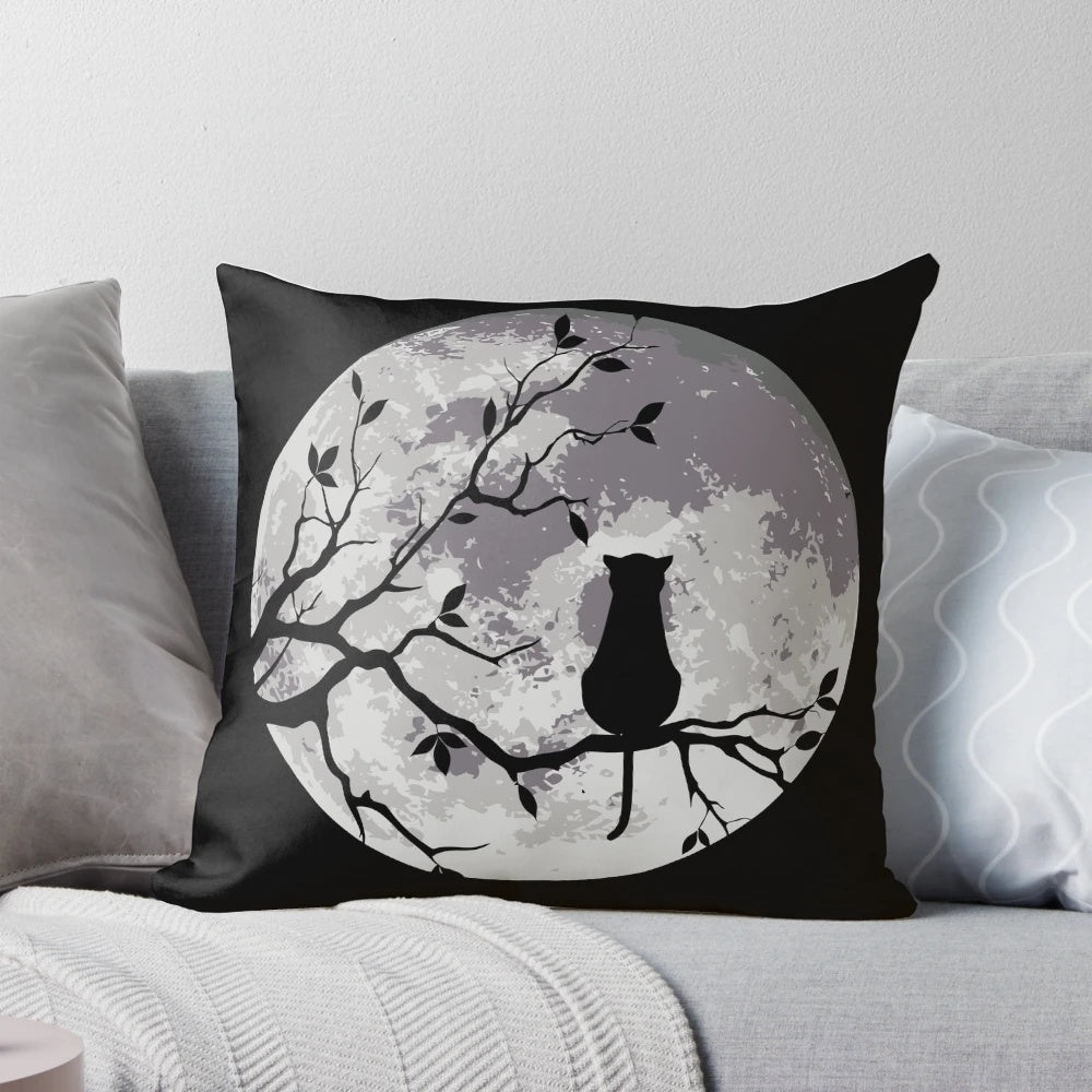 A cozy and enchanting cat and moon decorative pillow for a peaceful night's sleep.