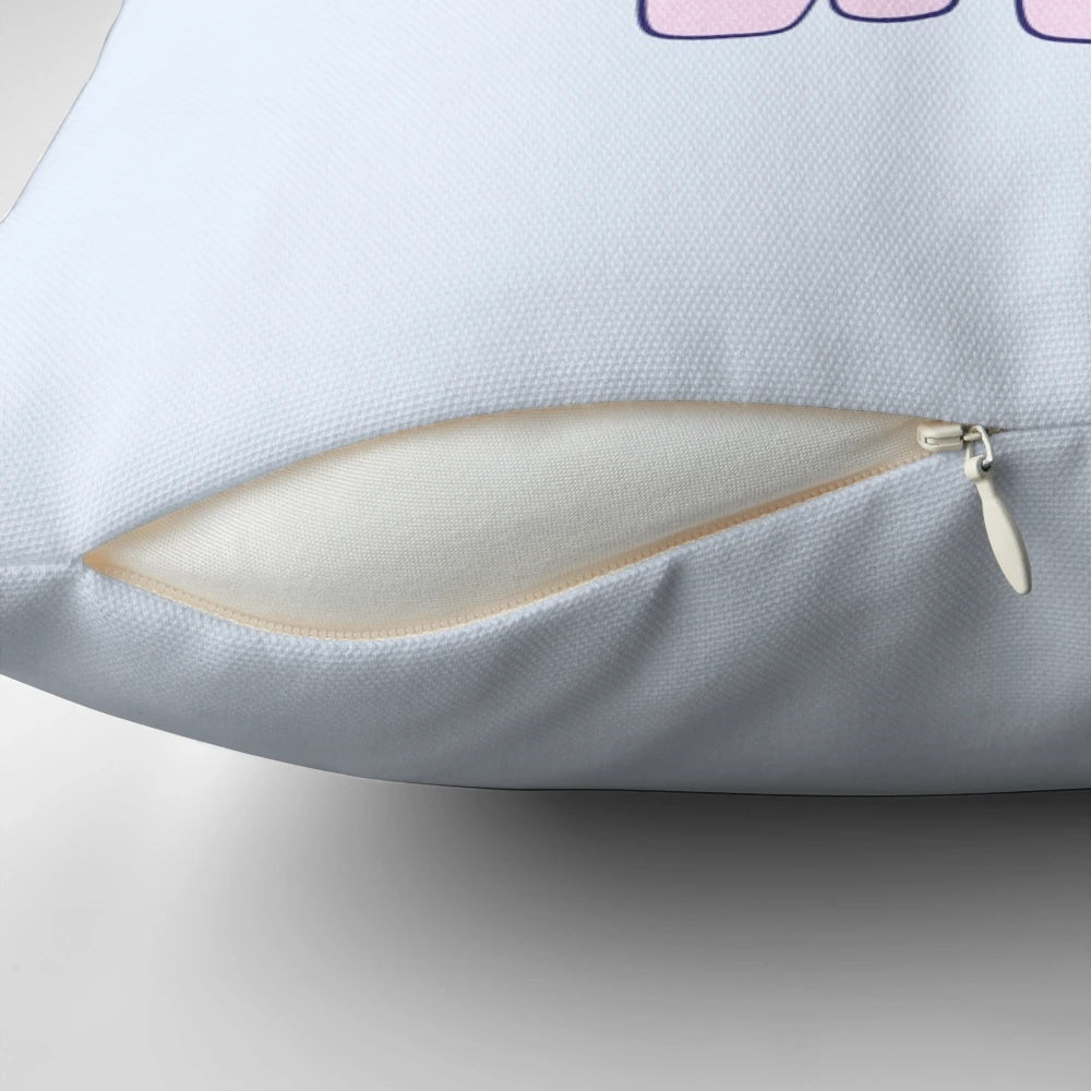 Cute cat riding a unicorn on a colorful, whimsical pillow.