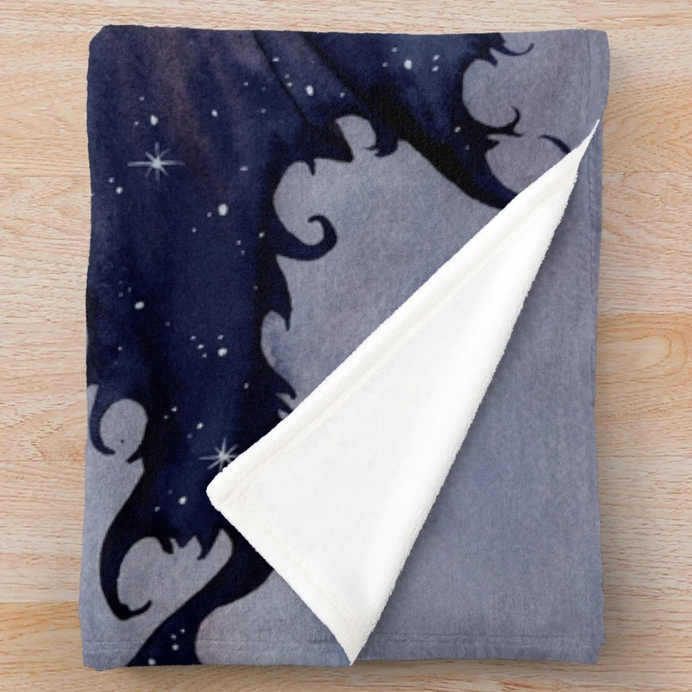 Plush blanket with a dark, starry night design featuring fairies and fantasy elements