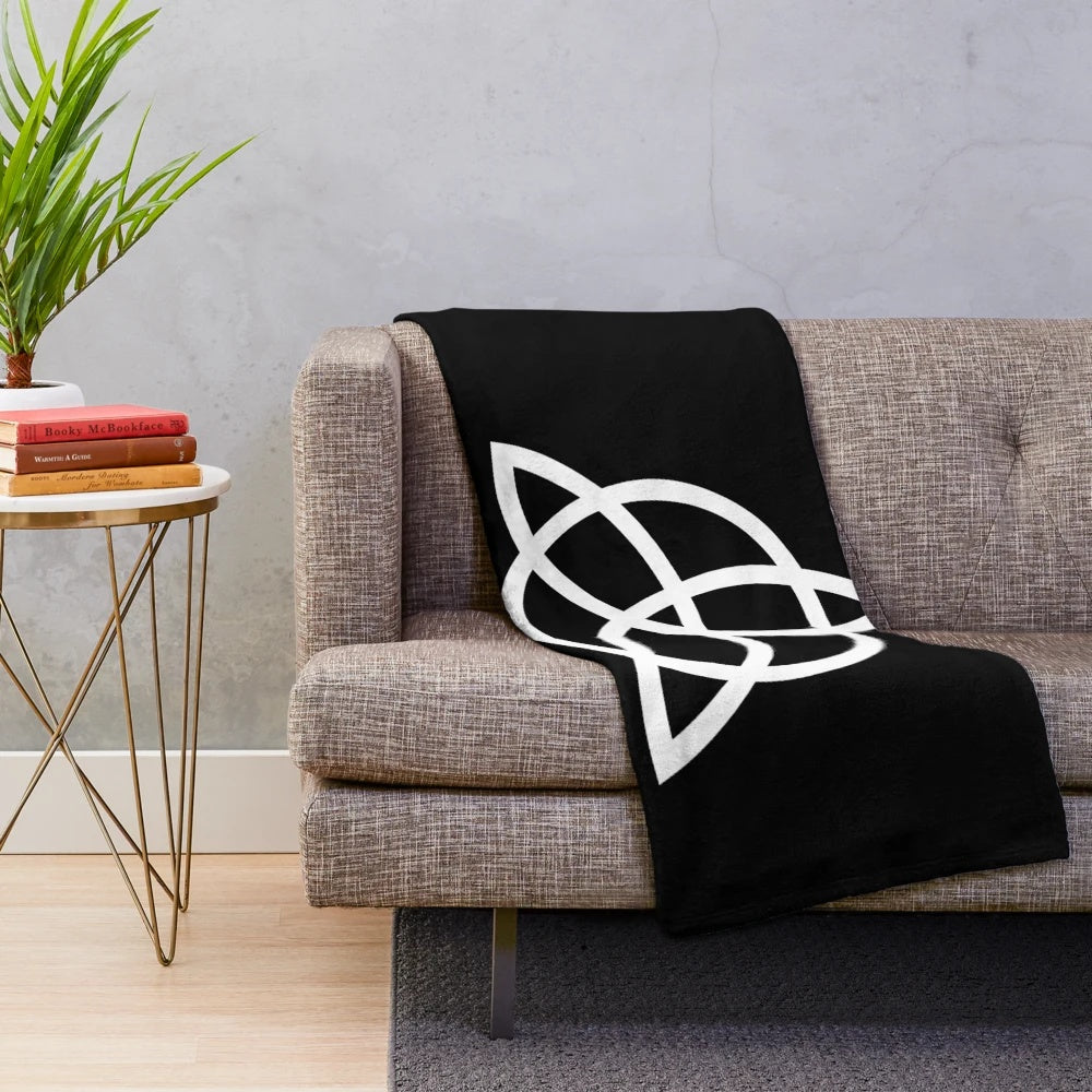 Charmed plush blanket featuring supernatural symbols and fan art design