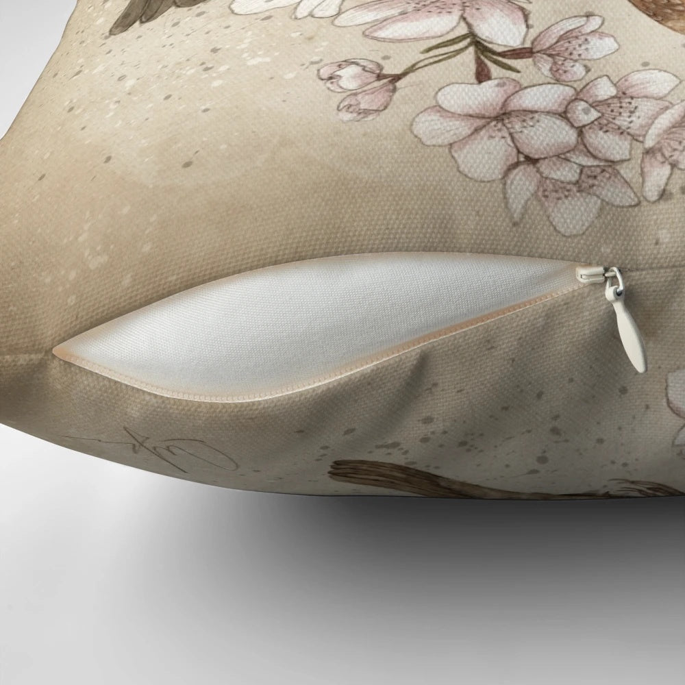Soft, plush pillow featuring a whimsical design of birds perched in a cherry blossom tree