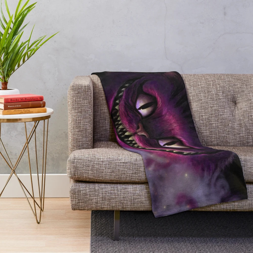 Cheshire Cat plush blanket with a whimsical and dark design