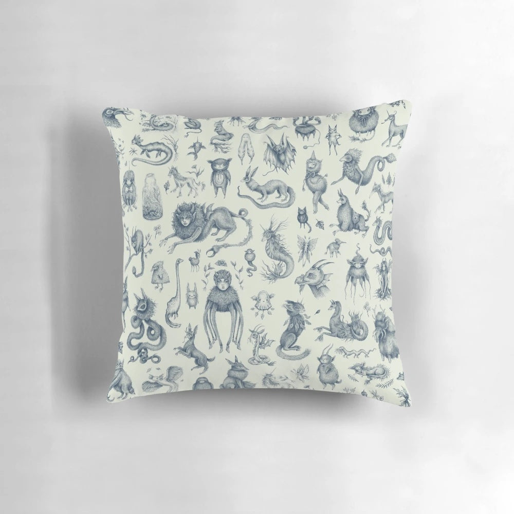 Throw pillow featuring a whimsical pattern of fantasy creatures like mythical beasts, wizards, and witches in a pastel, light-filled design.