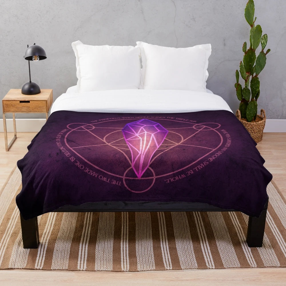 Dark Crystal inspired plush blanket featuring fantasy art elements