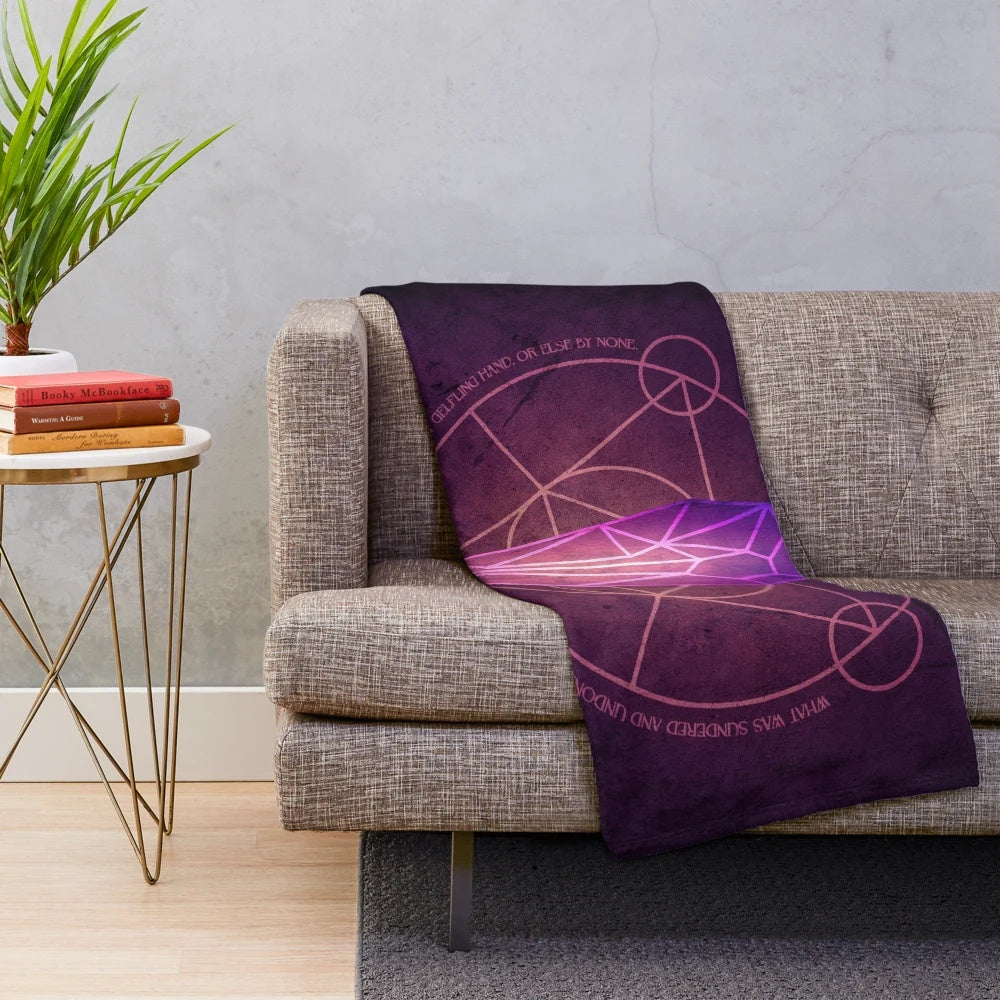 Dark Crystal inspired plush blanket featuring fantasy art elements