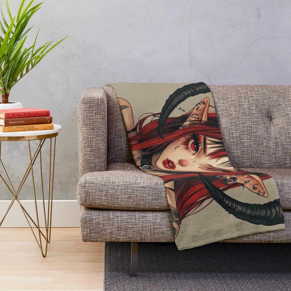 Dark fantasy plush blanket featuring a little goat devil character