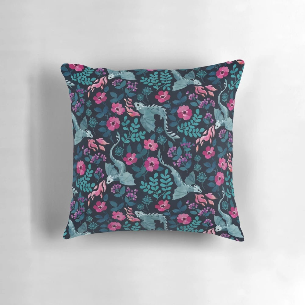 Vibrant dark floral pillow featuring watercolor illustrations of dragons, roses, and other nature-inspired motifs in rich jewel tones.