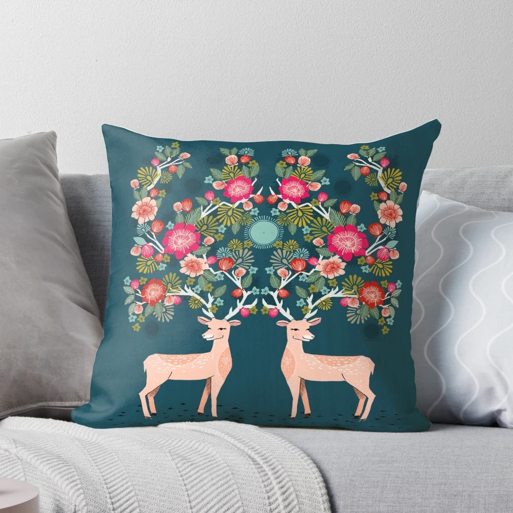 A beautiful deer and floral print pillow designed by Andrea Lauren