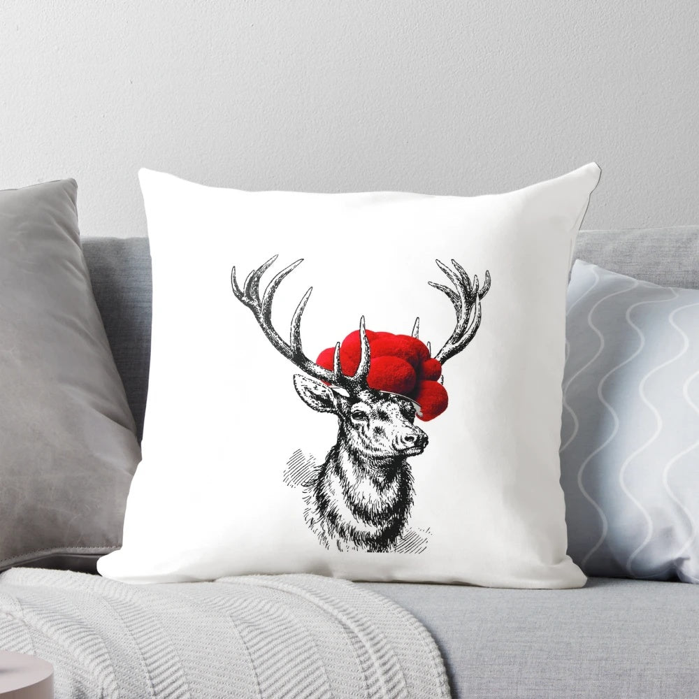 Decorative throw pillow featuring a deer wearing a traditional pollen hat, or Bollenhut, against a black forest background.
