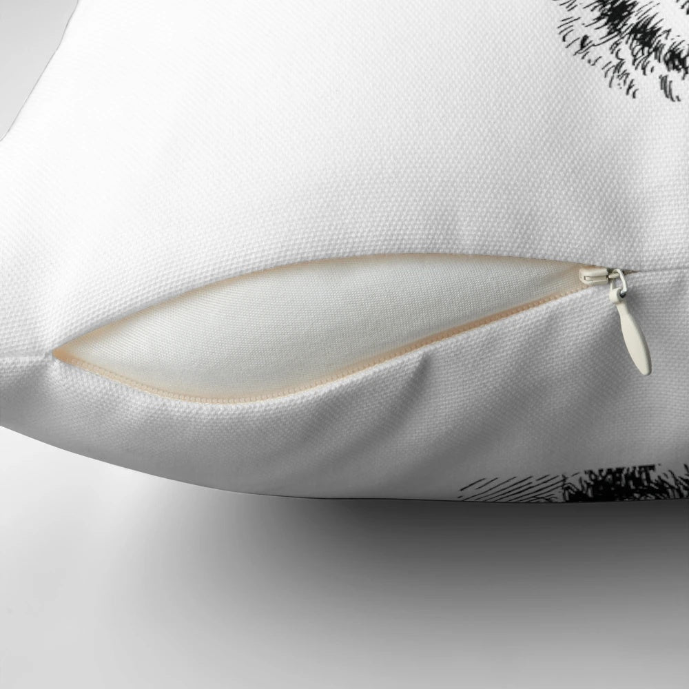 Decorative throw pillow featuring a deer wearing a traditional pollen hat, or Bollenhut, against a black forest background.