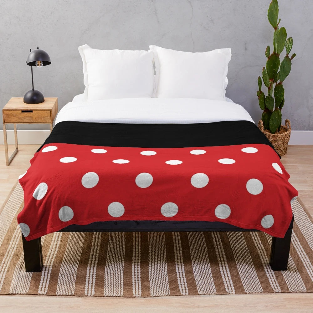 Disney-inspired plush blanket with iconic Mickey and Minnie Mouse silhouettes