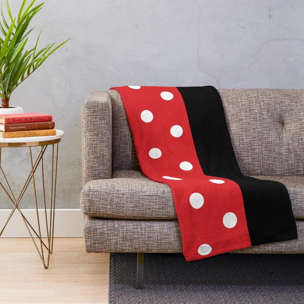 Disney-inspired plush blanket with iconic Mickey and Minnie Mouse silhouettes