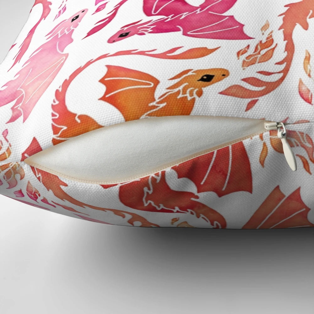 Whimsical watercolor-style dragon pillow with fiery pink and orange colors, perfect for adding a touch of magic to your home decor.