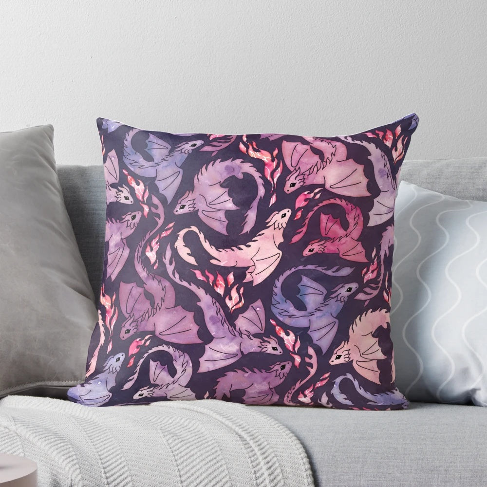 Whimsical dragon fire pillow in dark pink and purple hues, featuring a seamless watercolor design.