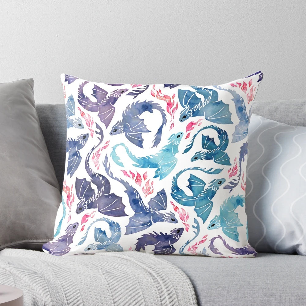A stunning Pillow featuring a magical dragon with fire breathing and turquoise and purple watercolor design