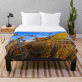 Dragon-themed plush blanket with abstract, colorful fantasy patterns