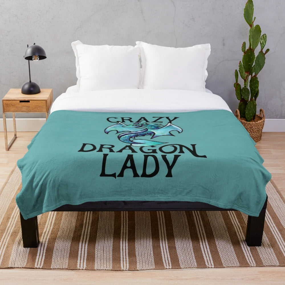 Plush dragon-themed blanket with intricate design