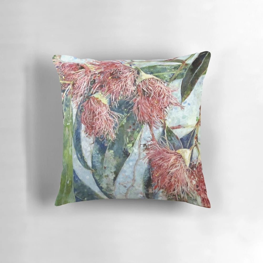 Soft, pink eucalyptus blossom pillow with lush, green leaves for a natural, serene touch.