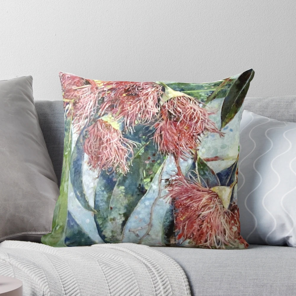 Soft, pink eucalyptus blossom pillow with lush, green leaves for a natural, serene touch.