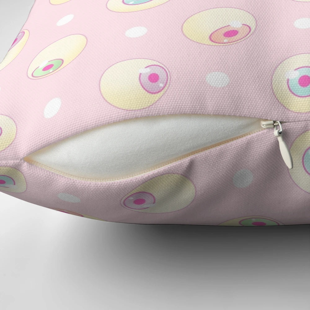 Soft, plush "Eye Candy" pillow in gothic, horror-inspired design with candy-colored eyeballs