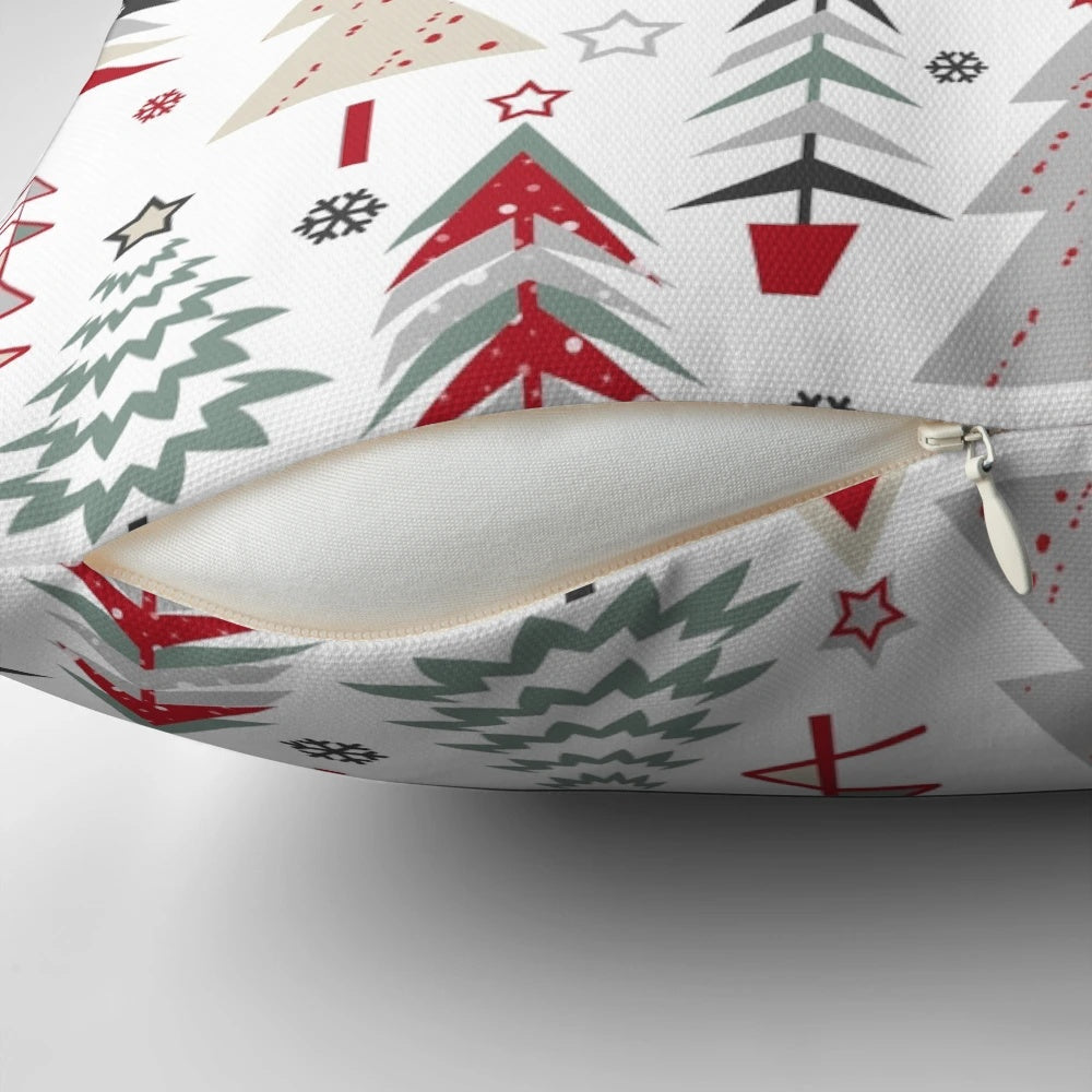 A cozy pillow featuring a whimsical forest scene with spruce trees, a Christmas tree, and a festive red and white palette, perfect for the holiday season.