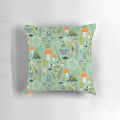 Whimsical fairy garden-inspired throw pillow with mint, pastel, and floral motifs